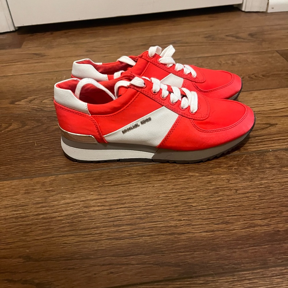 Michael Kors orange sneakers white stripe never worn 
#sneakers #MichaelKors